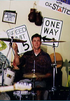 John playing    drums
